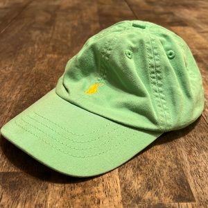 Polo Ralph Lauren sea foam green hat with yellow polo symbol and yellow writing